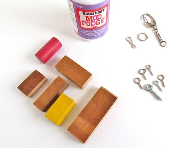 Wood blocks, Hard Coat Mod Podge, eye hooks, and keychain findings