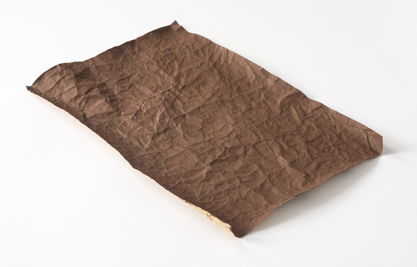 Paper bag painted with brown paint